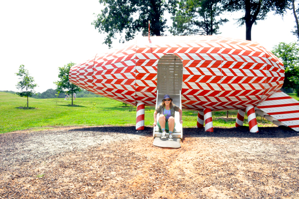 Karen Duquette on the pig-shaped slide